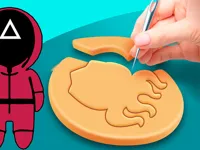 https://game.moais10.com/game/squid-game-cookie-puzzle